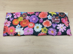 Körnerkissen bunte Blumen schwarz