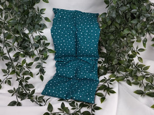 Körnerkissen mit petrolfarbenem Hintergrund und weißen Punkten